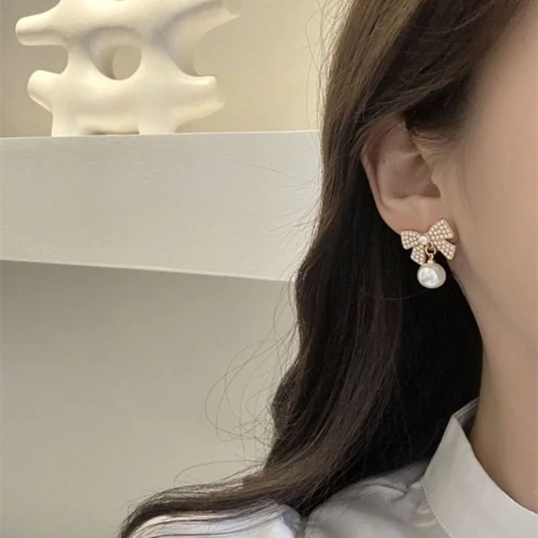 Gold Pearl Bow Earrings | Elegant Ribbon Pearl Earrings